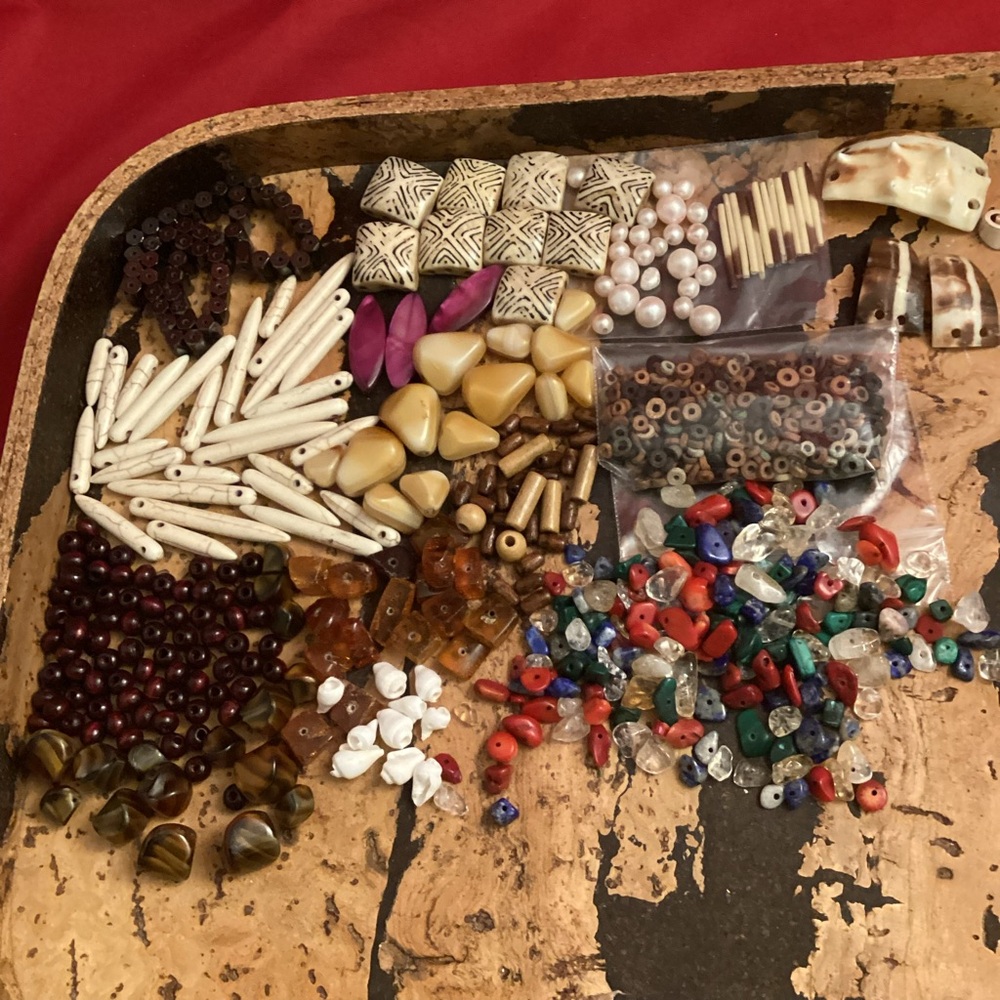 Beads lot mostly from natural materials tray not included